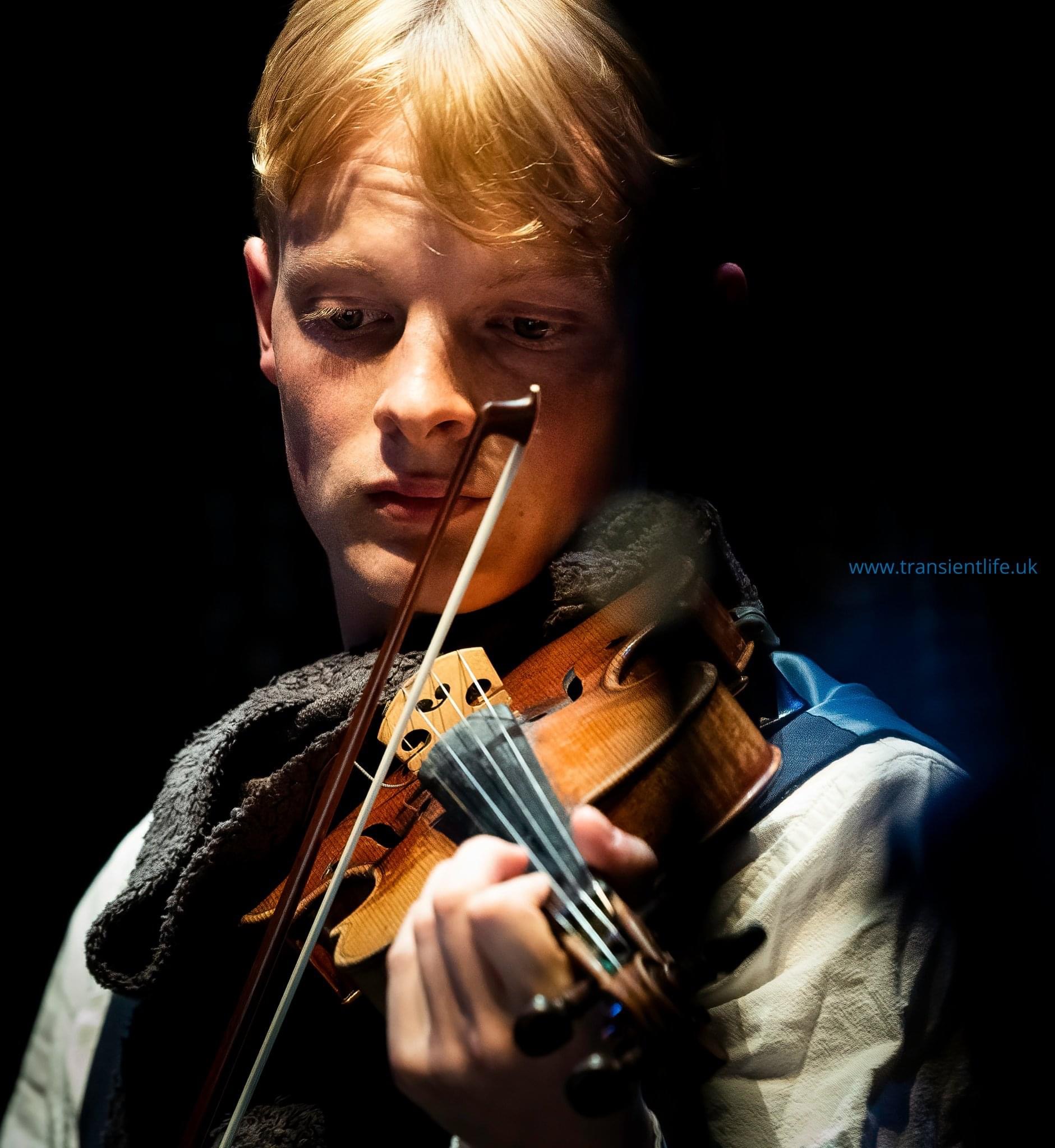Morgan Marshall playing violin in performance
